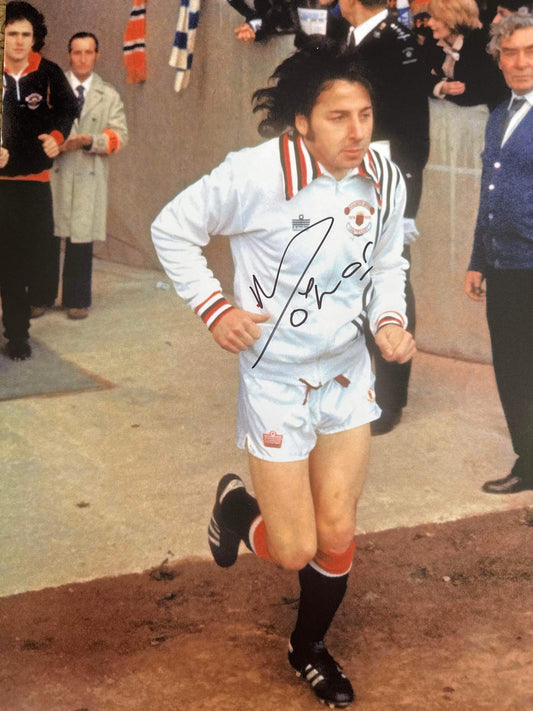 Signert av Mickey Thomas